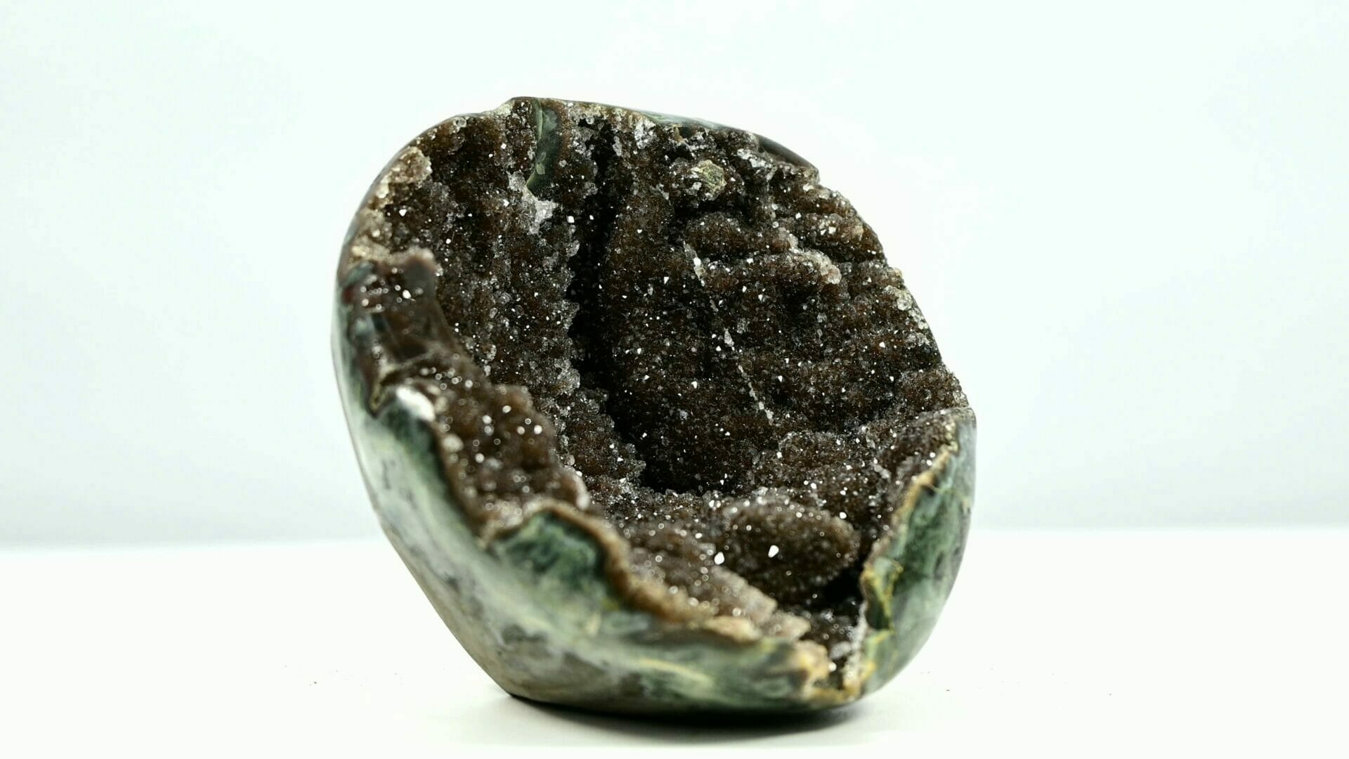 Super bling brown sugar druzy geode bowl with some belts and tiny trees inside side 2